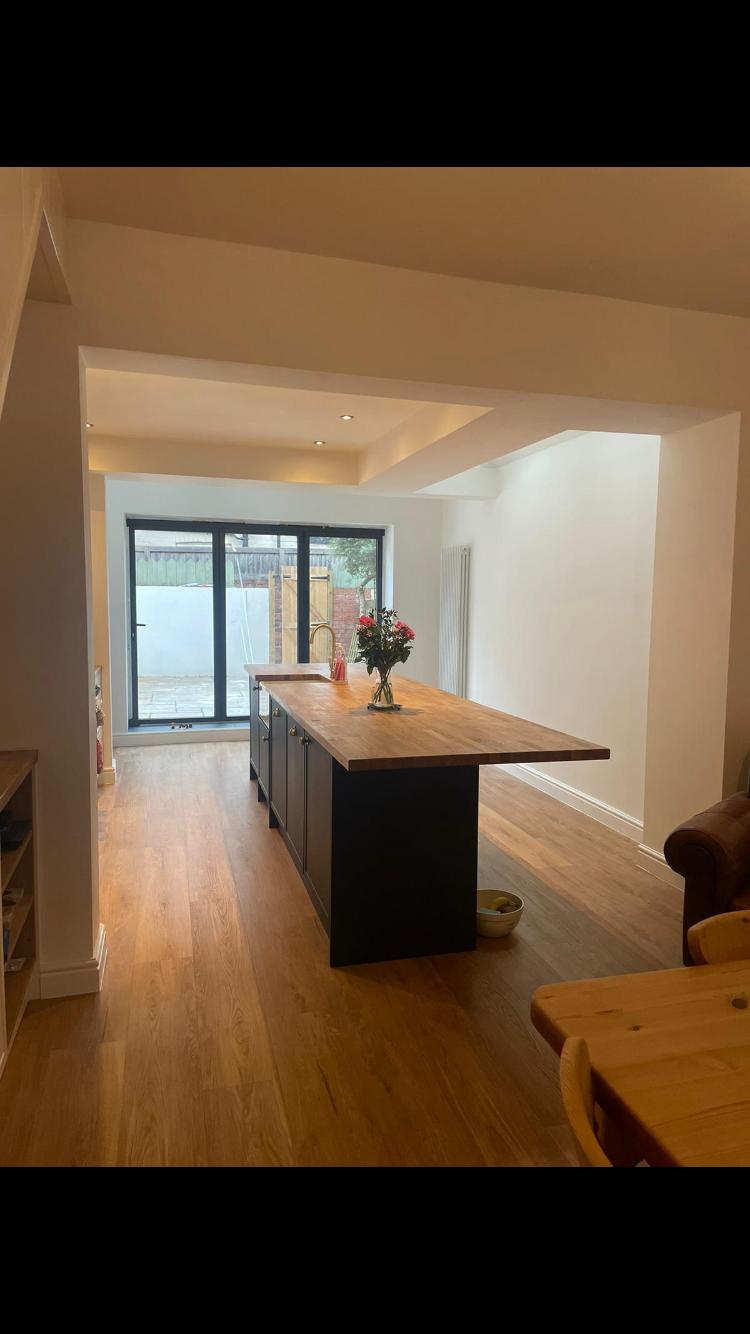 Rear extension kitchen with breakfast bar and oak worktops